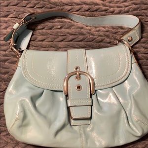 Light blue Coach Purse.